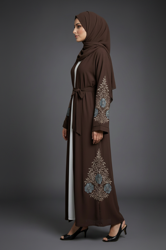 Woman wearing a brown embroidered abaya
